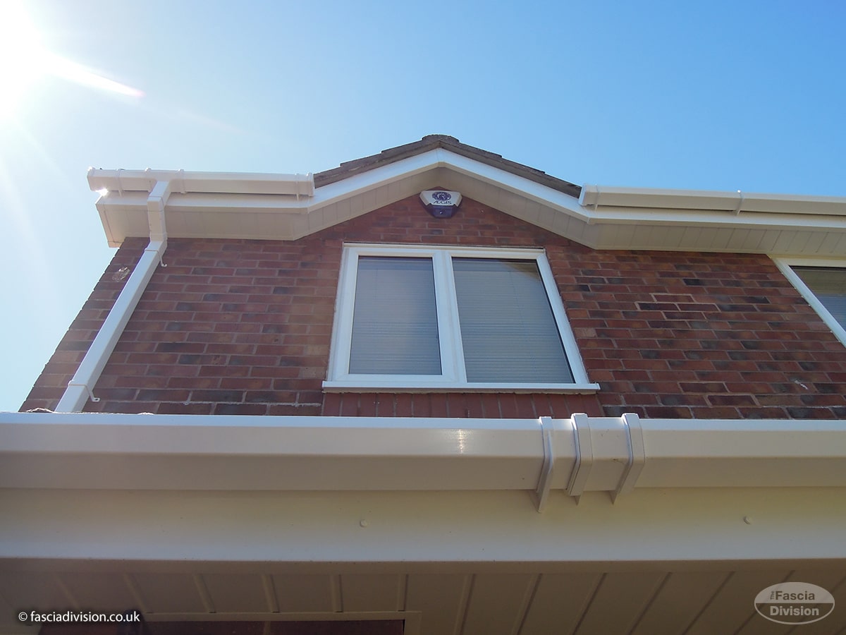 New white uPVC guttering installed on house